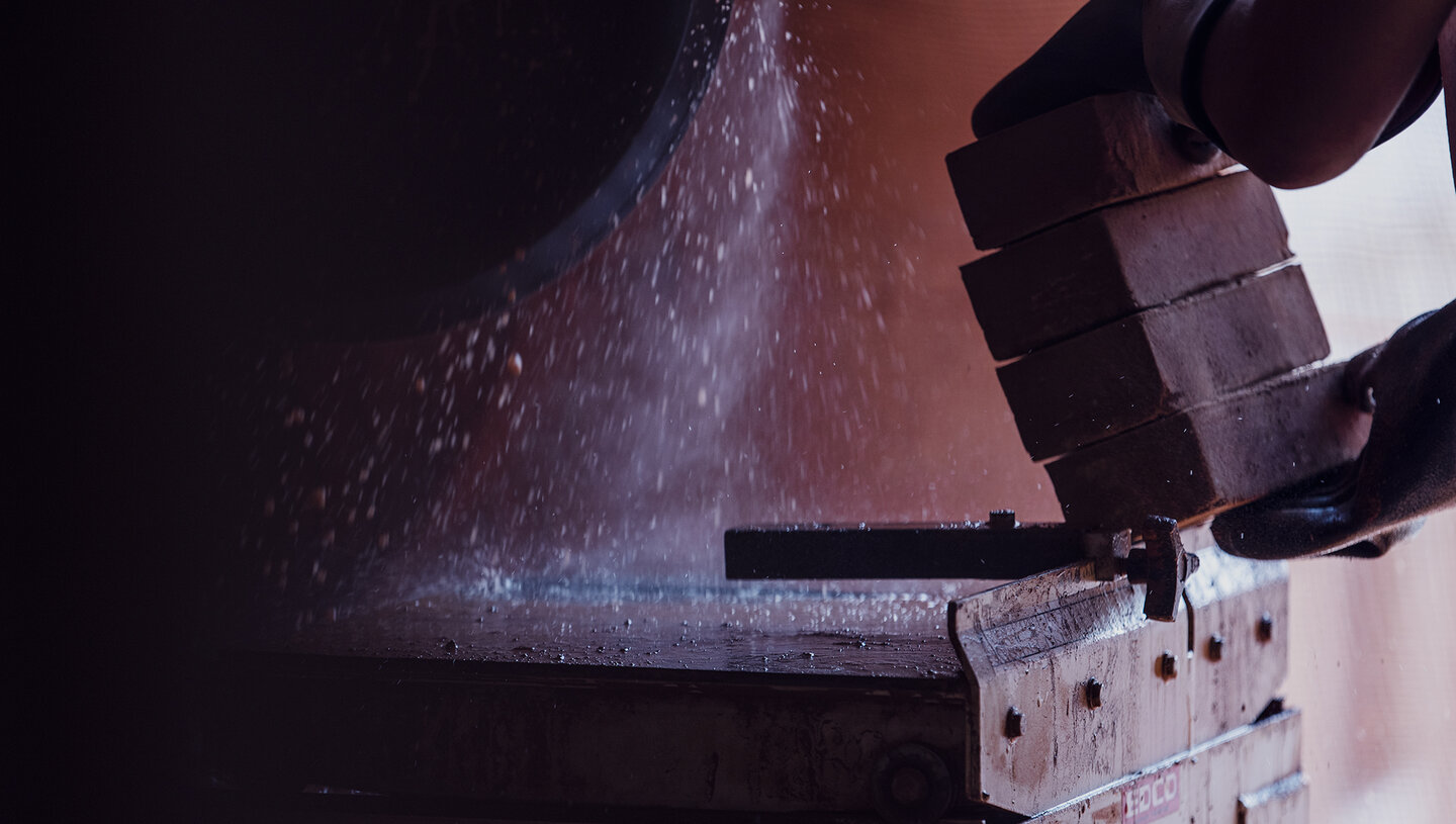 Craftsman creating bricks